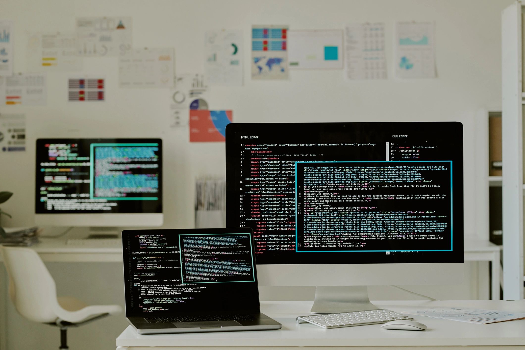 Workstation displaying technical systems and code
